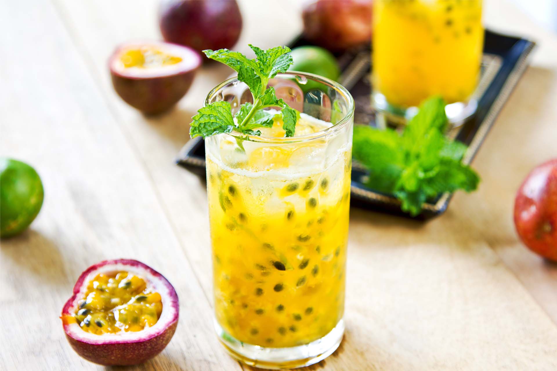 FULL OF PASSION FRUIT MOJITO IN A GLASS
