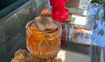 Bonfire Old Fashioned with a flamed marshmellow.