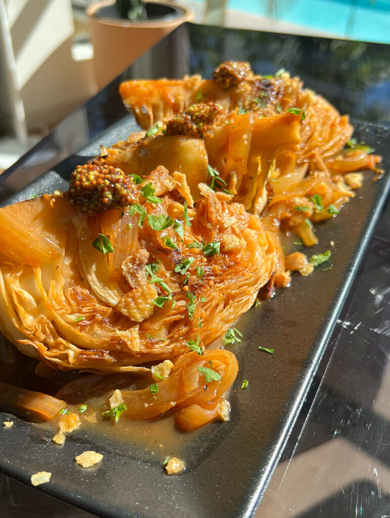 Charred Cabbage with Crispy Chicken Skin.