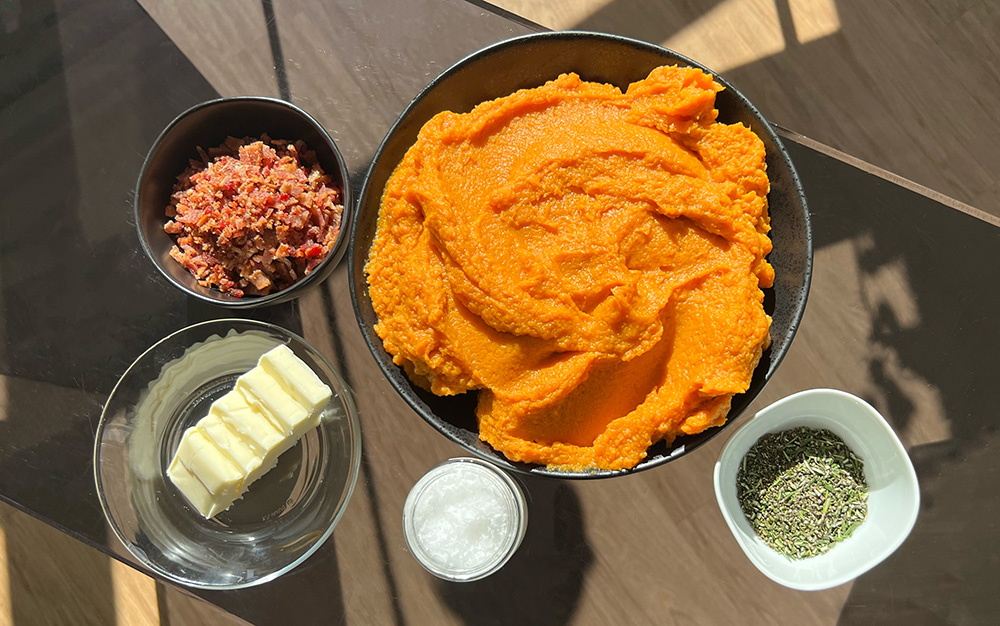 Sweet potato mash, butter, Finishing Salt, rosemary, and bacon.