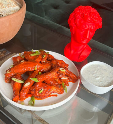 Fresno Chili Hot Wings with a side of Creme Fraiche Ranch.